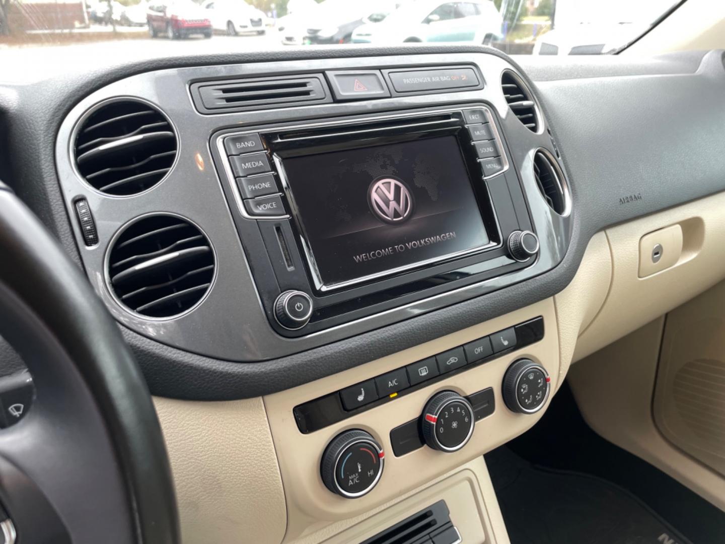 2017 WHITE VOLKSWAGEN TIGUAN S (WVGAV7AX7HK) with an 2.0L engine, Automatic transmission, located at 5103 Dorchester Rd., Charleston, SC, 29418-5607, (843) 767-1122, 36.245171, -115.228050 - Clean Interior with Leather, CD/AUX/USB/Bluetooth, Power Everything (windows, locks, seat, mirrors), Heated Seats, All-weather Mats, Push Button Start, Keyless Entry, Alloy Wheels. Clean CarFax (no accidents reported!) Local Trade-in!! 99k miles Located at New Life Auto Sales! 2023 WINNER for Pos - Photo#16